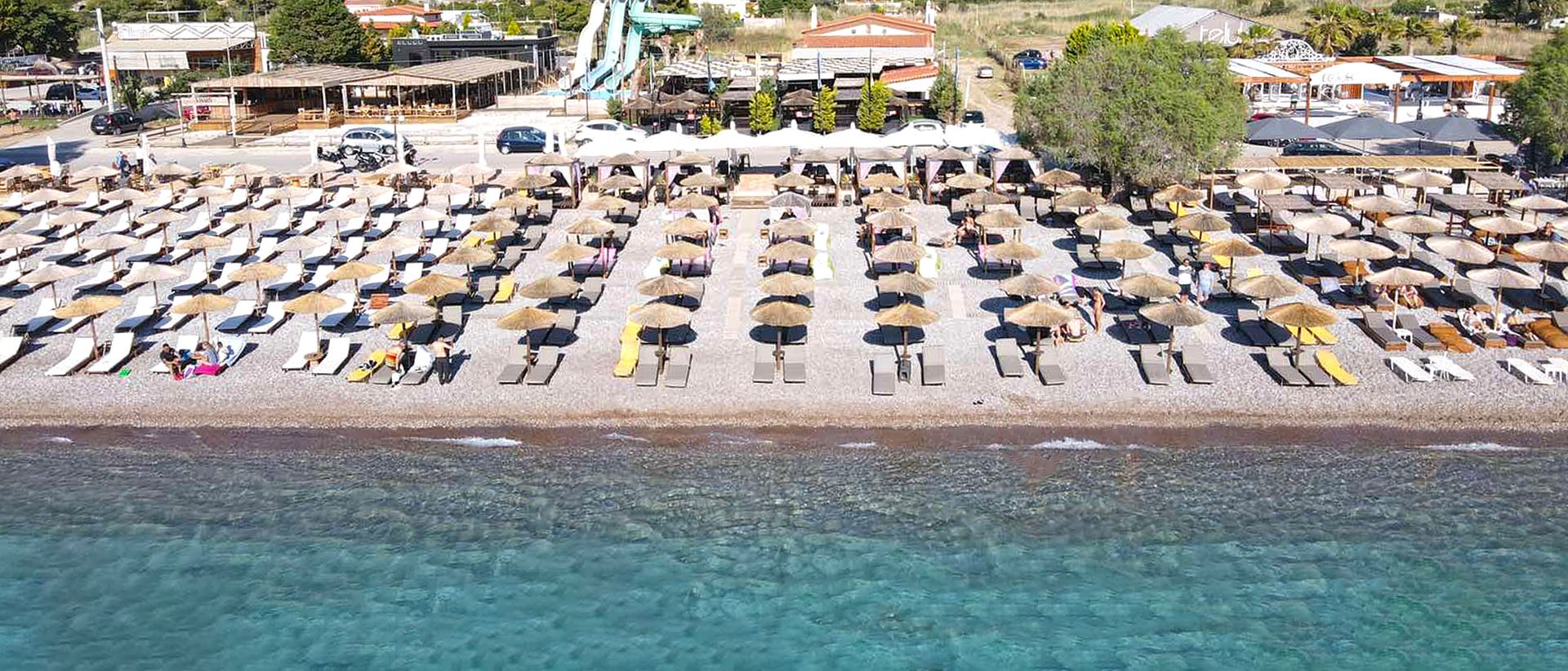 Psatha Summer Bar — sunbeds by the sea